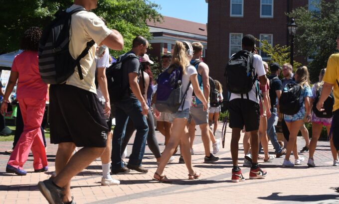 College students walking across campus