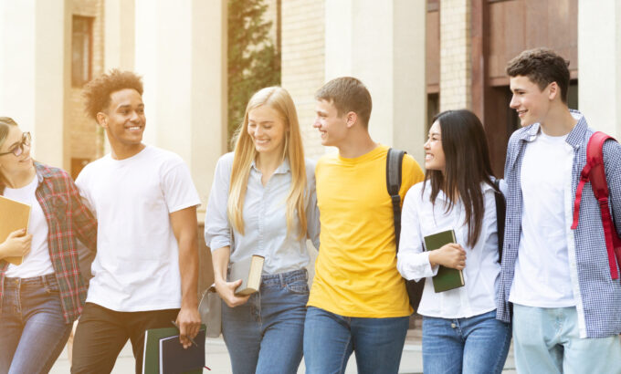 Campus life rhythm. Students going to classes and talking about exams, panorama